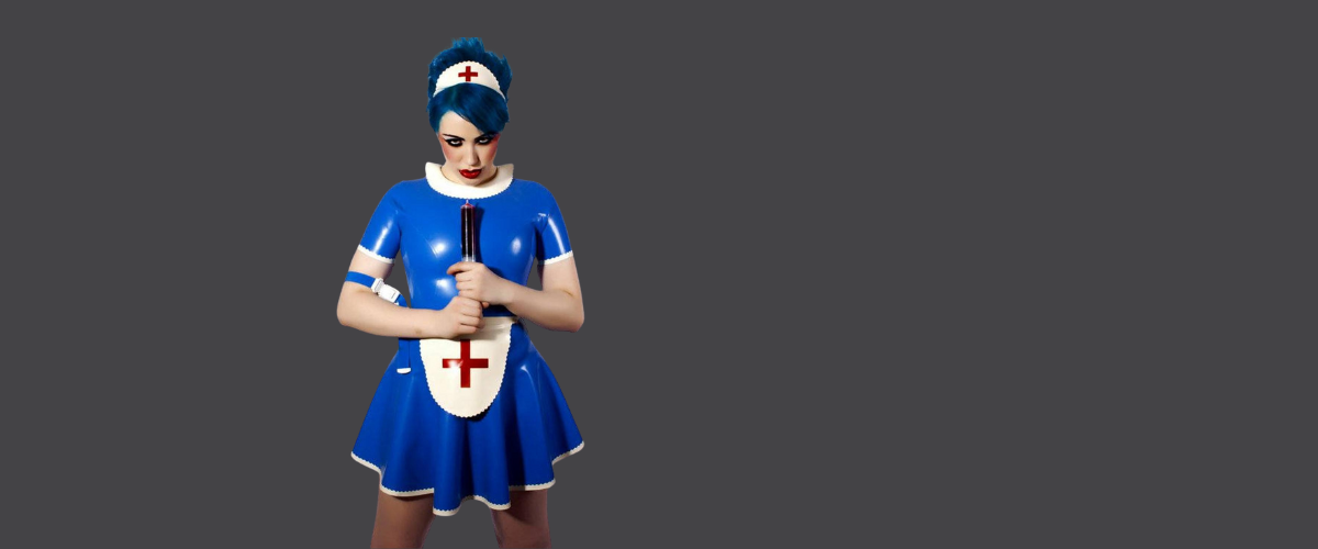 a latex nurse costume in bright blue with white trim detail. The outfit includes a little cap and apron with red cross applique.